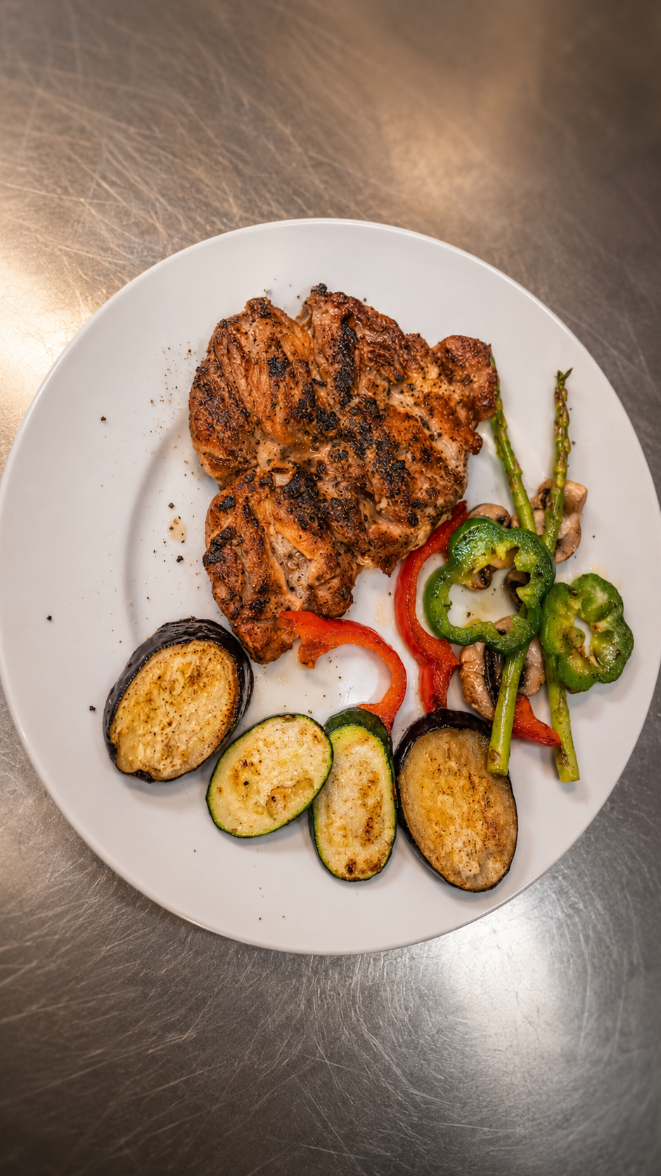 Pollo a la brasa de leña